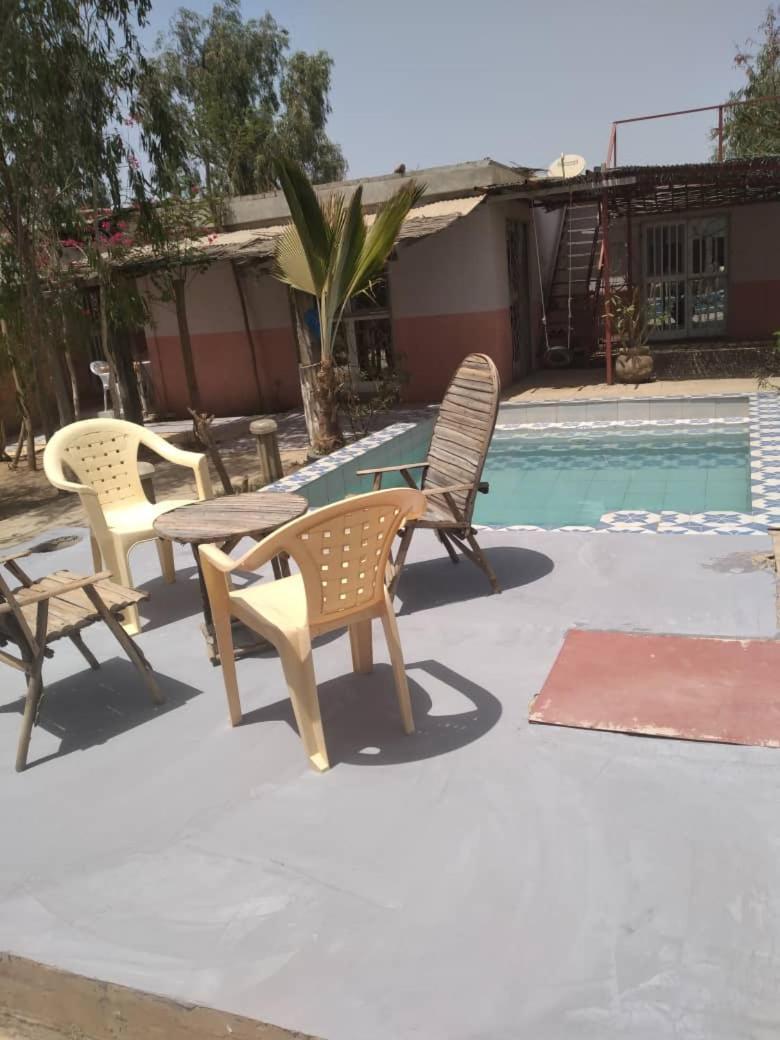 La Maison Blanche Ndangane Bagian luar foto